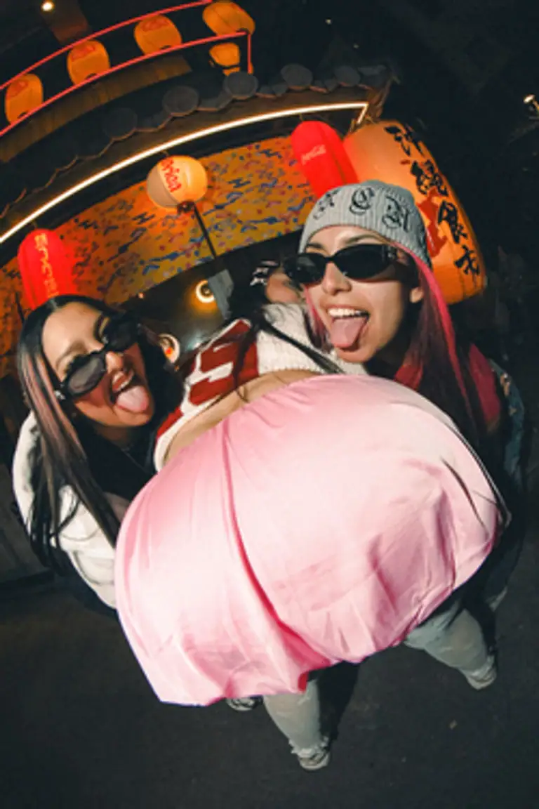 A playful group shot on a girls' trip in Tokyo